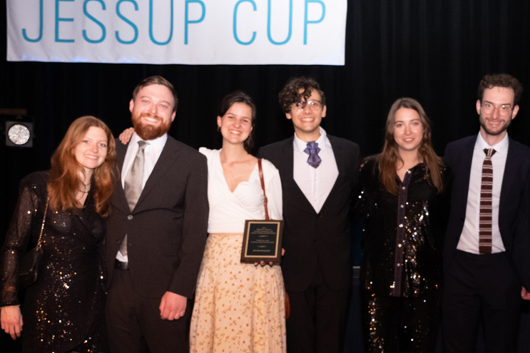 The 2023 Vienna Jessup team, along with their coaches, at the closing ceremony of the international rounds in Washington, D.C.